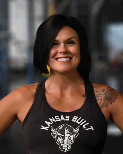 Headshot of Kristy Cronister, personal trainer at Kansas Built Fitness